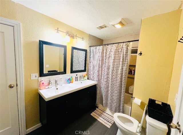 full bathroom with vanity, toilet, shower / bathtub combination with curtain, a textured ceiling, and tasteful backsplash