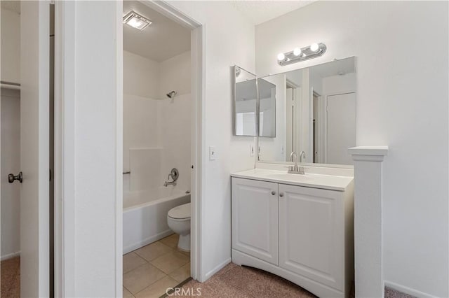 full bathroom with tile patterned flooring, vanity, bathing tub / shower combination, and toilet