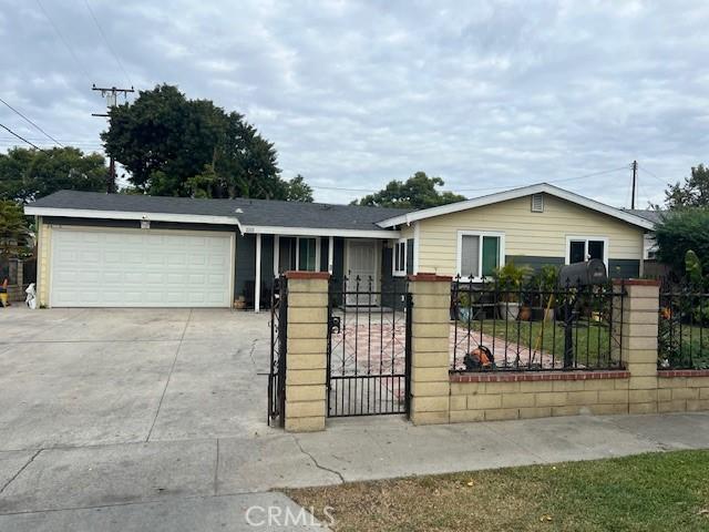 ranch-style home with a garage