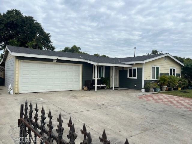 single story home with a garage