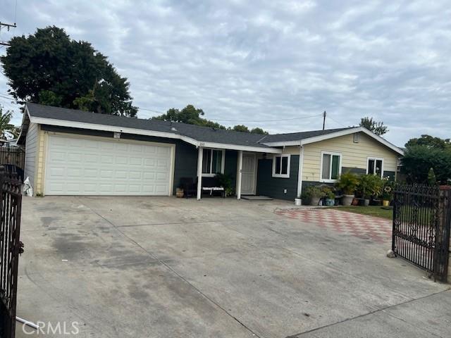 single story home with a garage