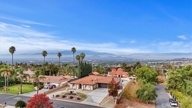 drone / aerial view featuring a mountain view