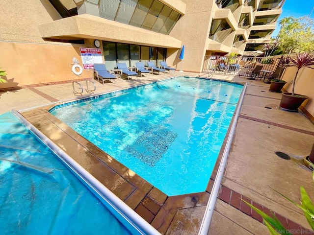 view of pool with a patio area