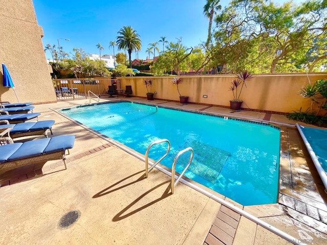 view of pool with a patio area