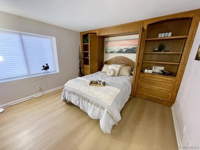 bedroom featuring light hardwood / wood-style flooring