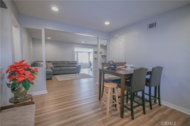 dining area featuring light hardwood / wood-style floors