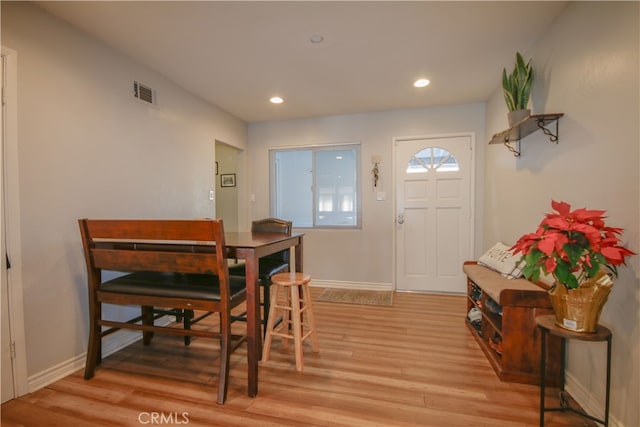 dining room featuring light hardwood / wood-style floors