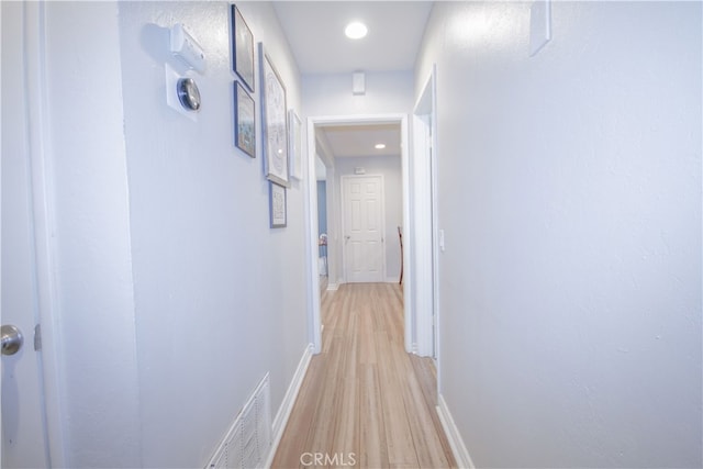 corridor featuring light wood-type flooring