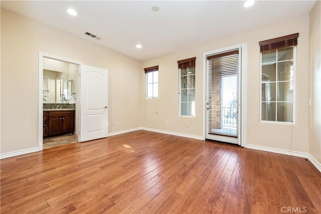 empty room featuring hardwood / wood-style floors