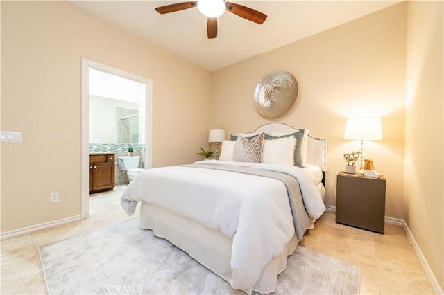 tiled bedroom featuring ceiling fan and connected bathroom