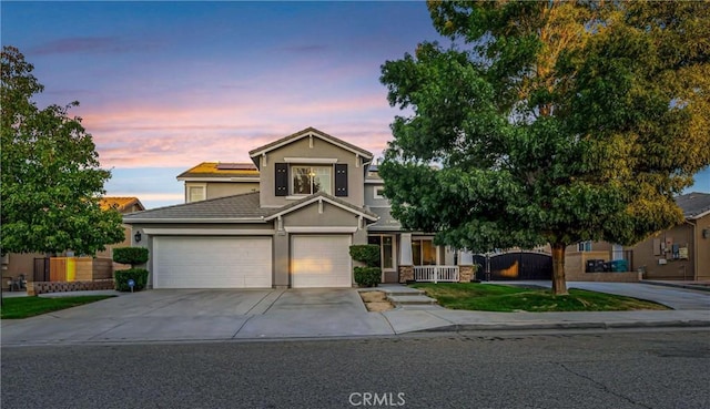 view of front of property featuring a garage