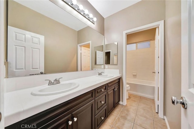 full bathroom featuring tile patterned flooring, vanity, bathtub / shower combination, and toilet