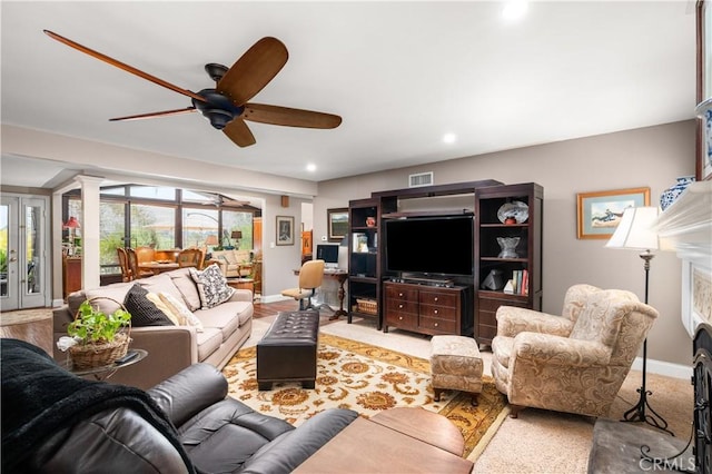 living room with ceiling fan