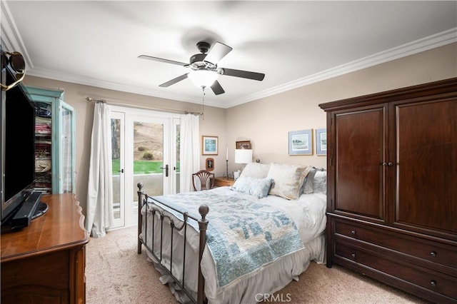 bedroom with ceiling fan, access to exterior, light colored carpet, and crown molding