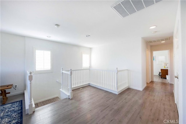 hall featuring hardwood / wood-style flooring