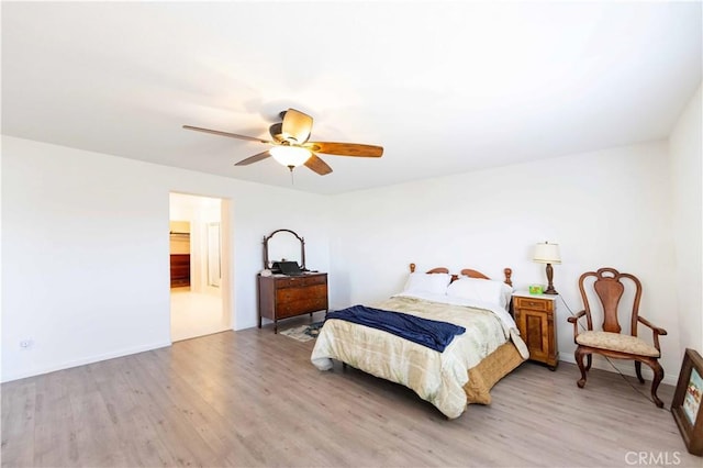 bedroom with light wood-type flooring and ceiling fan