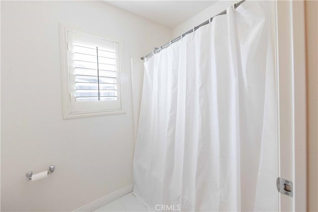 bathroom featuring tile patterned flooring