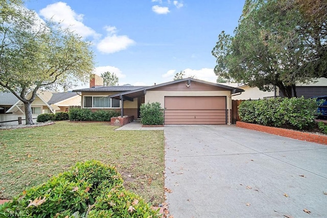 single story home with a front lawn and a garage