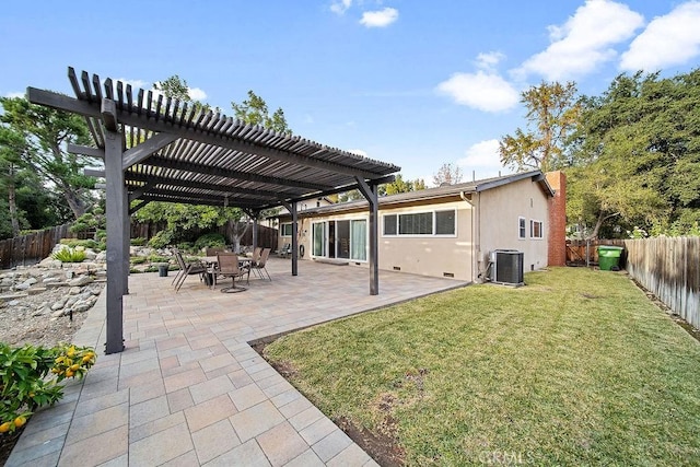 back of house with a yard, a pergola, and central AC