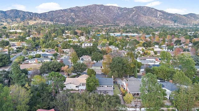 birds eye view of property featuring a mountain view