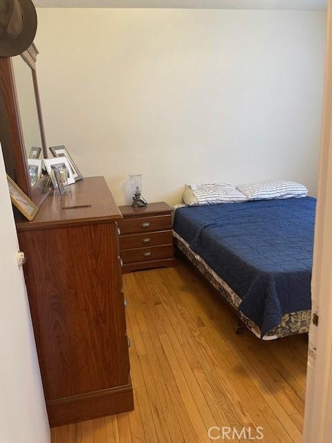 bedroom featuring light hardwood / wood-style flooring