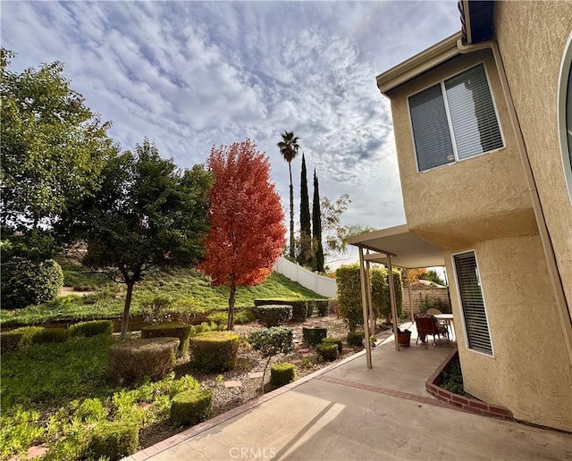 view of patio with fence