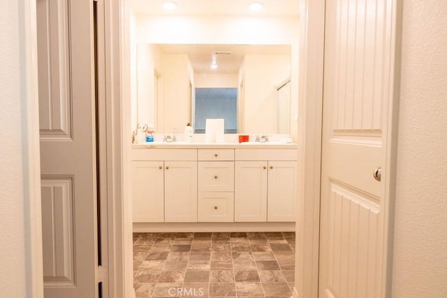 bathroom featuring vanity