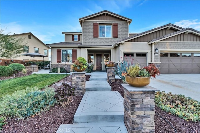 craftsman-style home with a garage