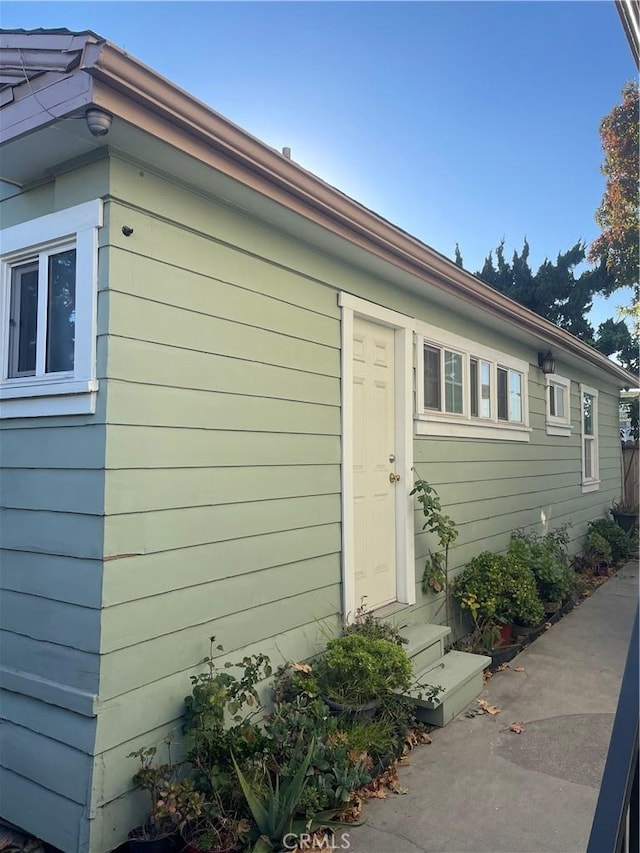 view of home's exterior with entry steps