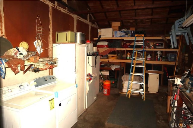 storage room with separate washer and dryer