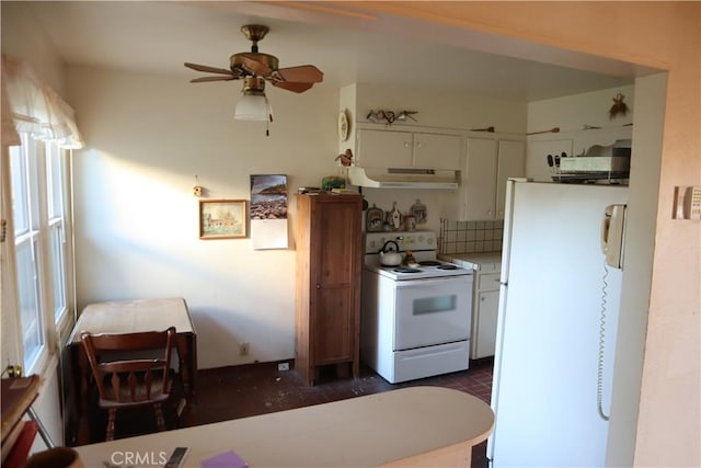 kitchen featuring tasteful backsplash, ceiling fan, white appliances, and white cabinets