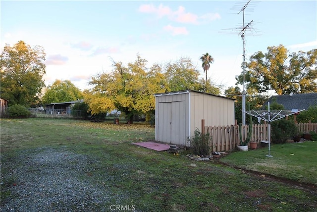 view of outdoor structure featuring a yard