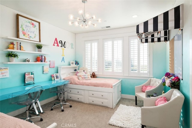 bedroom with a notable chandelier and light colored carpet