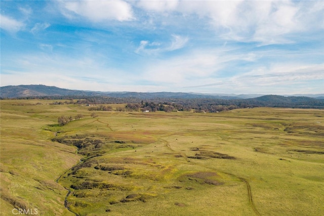 view of mountain feature with a rural view