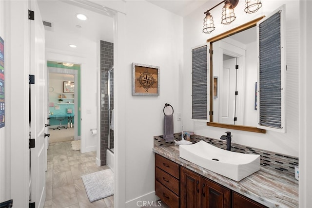 bathroom with vanity and bathtub / shower combination