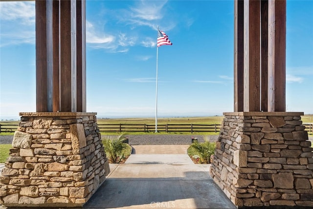 view of patio with a rural view