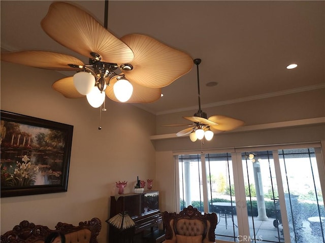 living room featuring french doors, crown molding, ceiling fan, and a healthy amount of sunlight