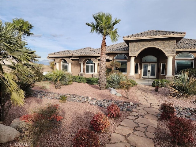 rear view of house with french doors