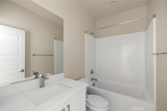 full bathroom featuring bathtub / shower combination, vanity, and toilet