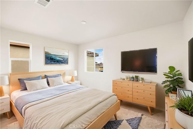 bedroom featuring light wood-type flooring