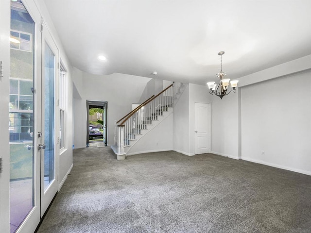 interior space featuring an inviting chandelier, a wealth of natural light, and french doors