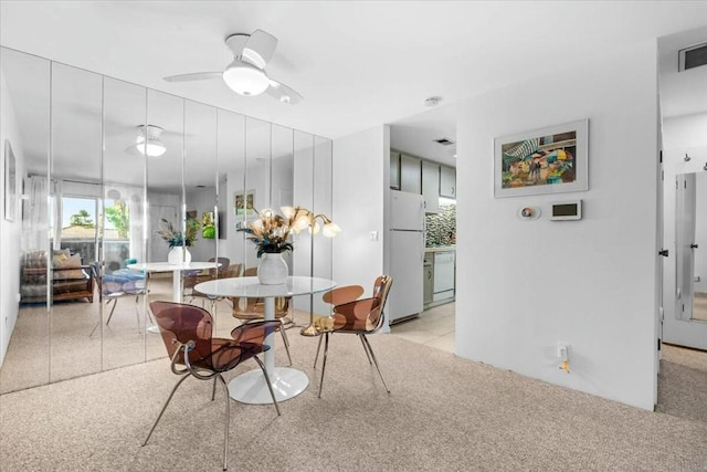 dining room with ceiling fan