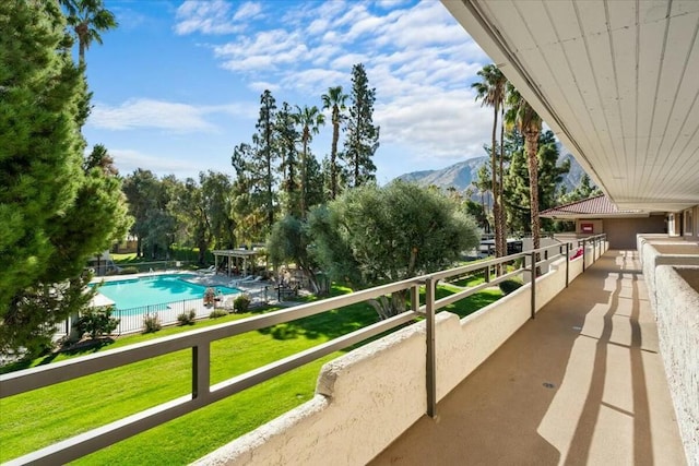 balcony featuring a mountain view