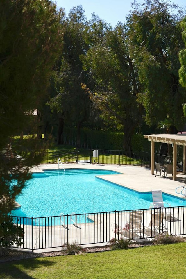 view of pool featuring a patio