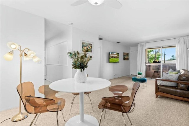 dining area with ceiling fan