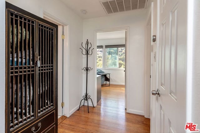 hallway featuring light hardwood / wood-style floors