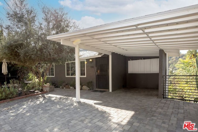 view of patio with a carport