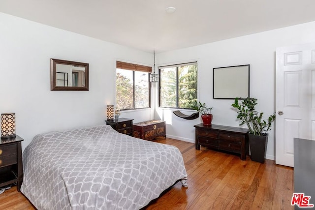 bedroom featuring light hardwood / wood-style flooring