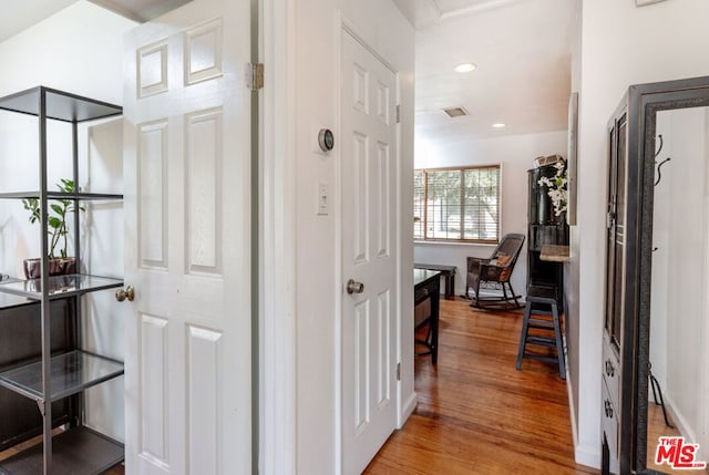 hall featuring hardwood / wood-style flooring