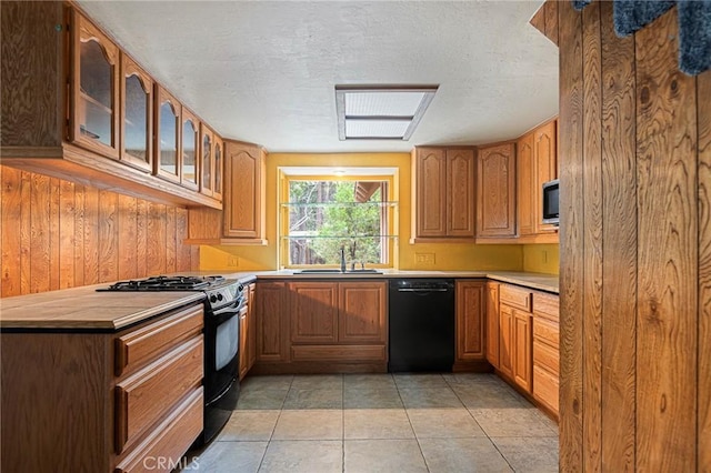 31413 Overhill Dr, Running Springs, CA 92382 - kitchen with black appliances, glass insert cabinets, brown cabinets, light tile patterned floors, and a textured ceiling